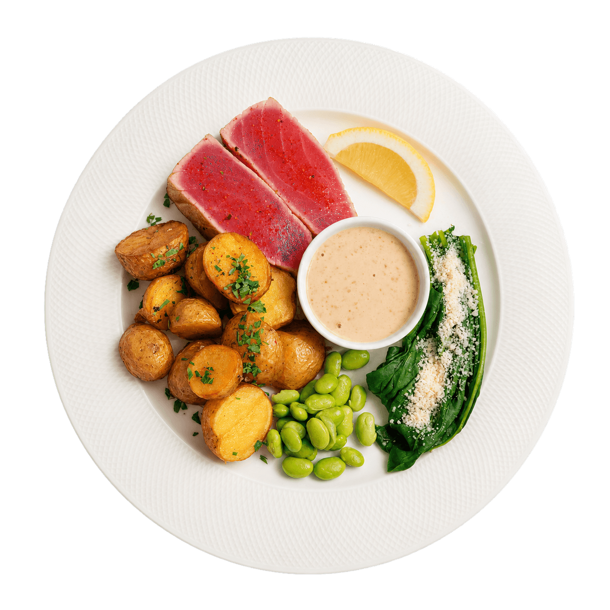 Prato com atum, batatas, edamame e vegetais